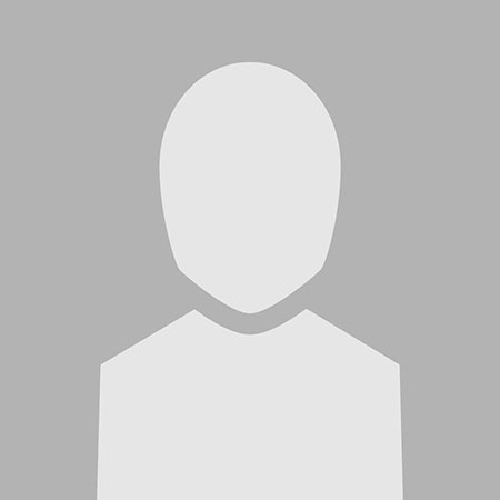 A blank silhouette representing an unidentified person, featuring a simple head and shoulder outline on a gray background.